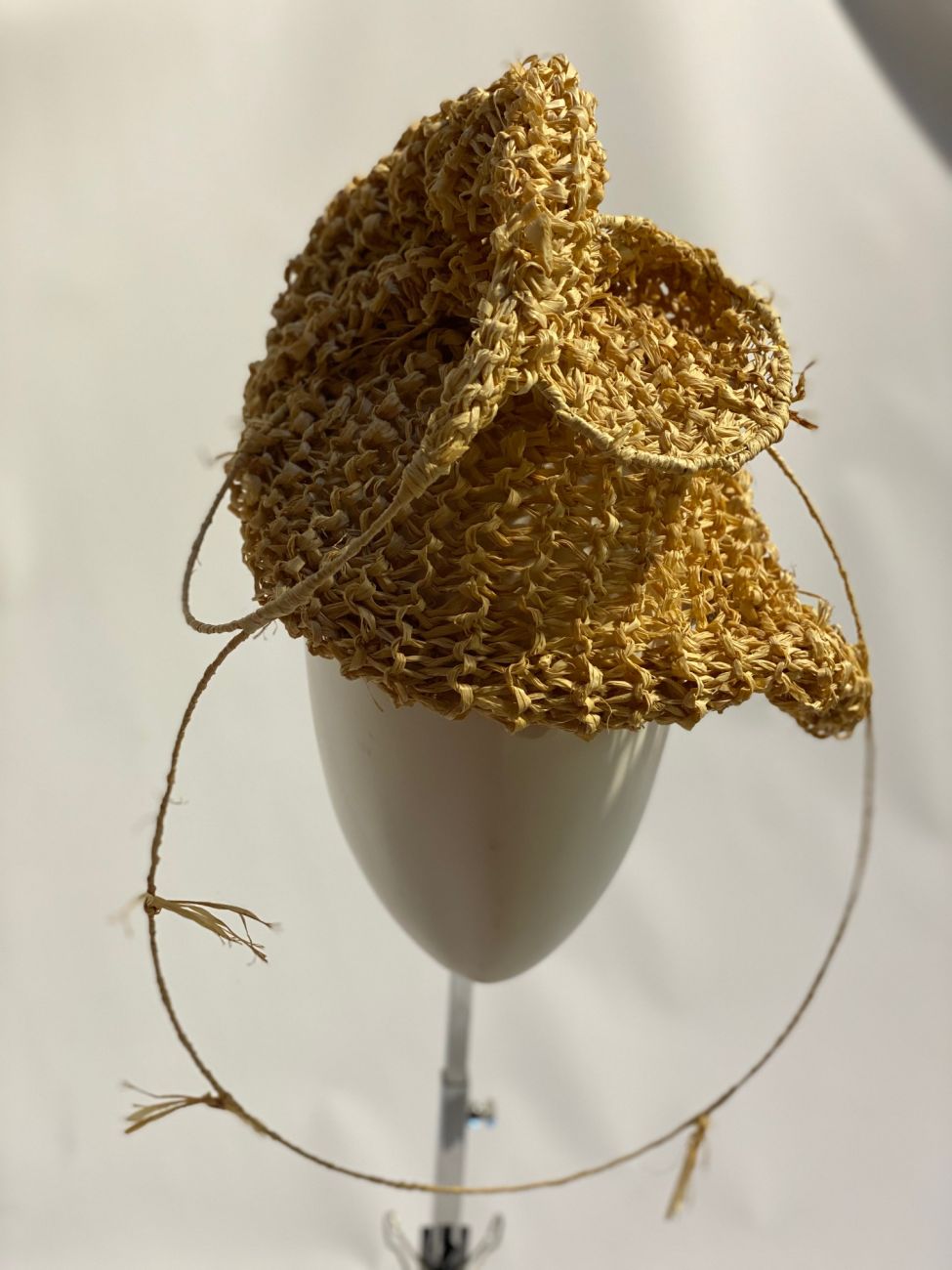 Yellow knitted hat by Waltraud Reiner