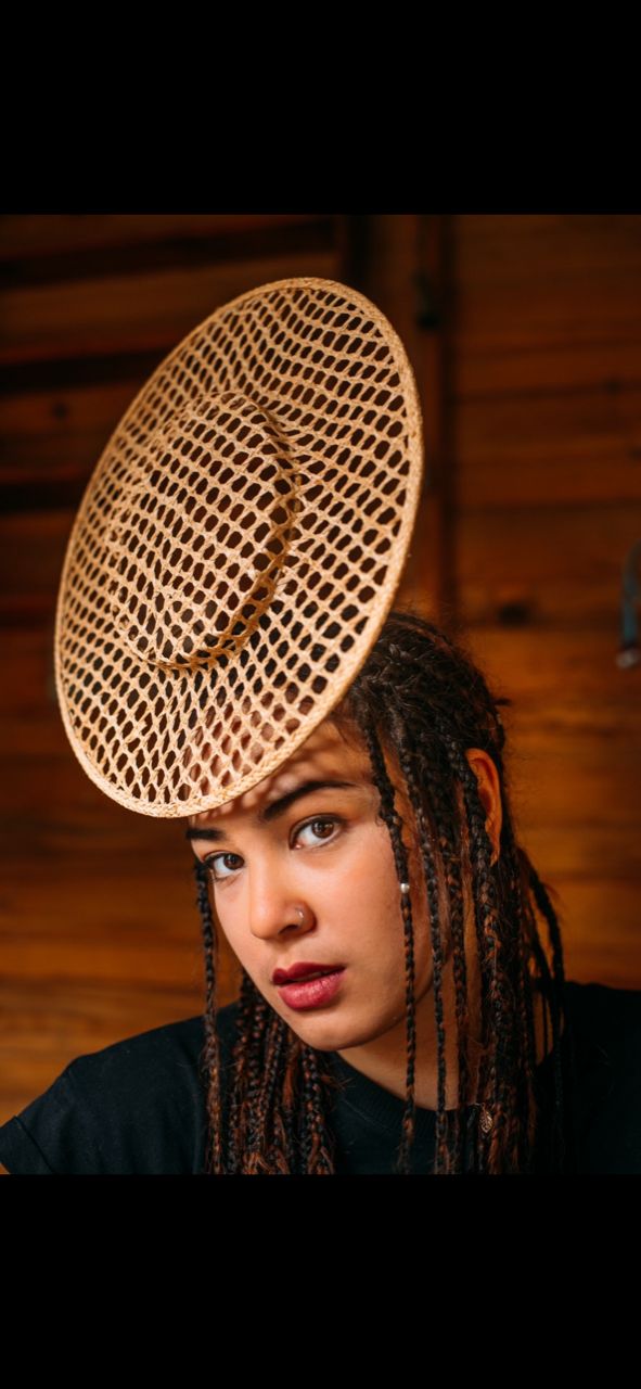 Floating straw hat by Waltraud Reiner