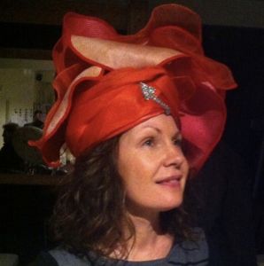 Drapped red hat by Waltraud Reiner